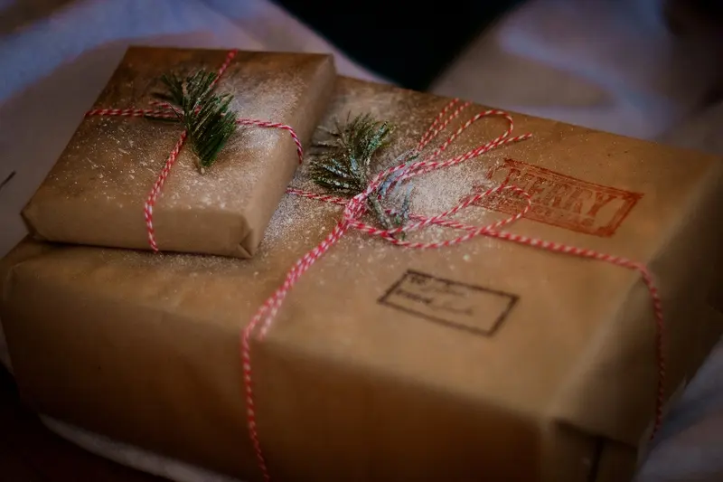 Presents wrapped in brown paper and string